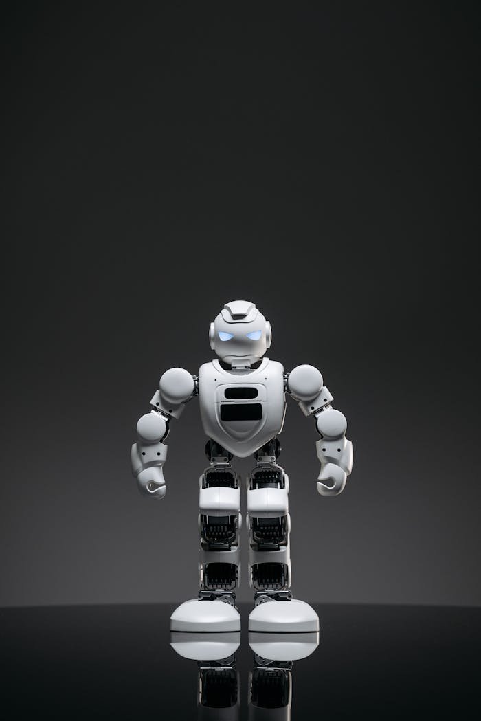 High-tech toy robot displayed against a gray backdrop. Ideal for tech themes.